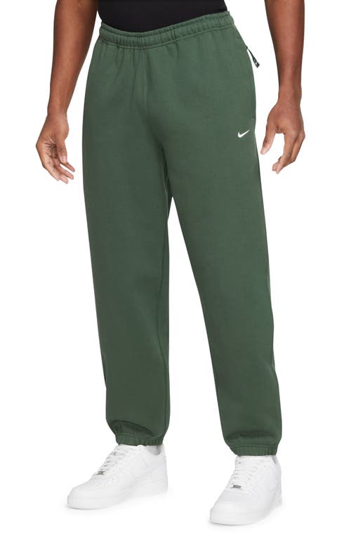Nike Solo Swoosh Fleece Sweatpants In Green