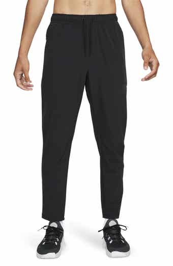 Men's trousers Nike Therma-FIT Tapered Fitness Pants - deep jungle/deep  jungle/black, Tennis Zone