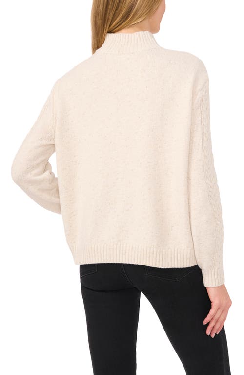 Cece Metallic Mock Neck Cable Stitch Sweater In Birch