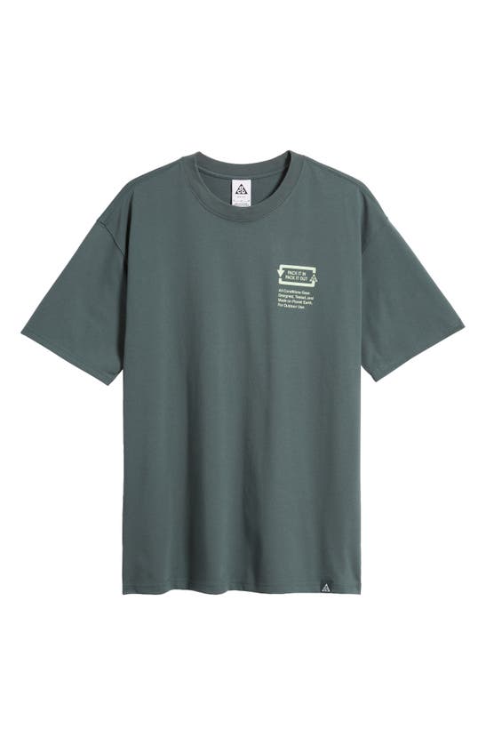 Shop Nike Dri-fit Acg Pack It Out Oversize Graphic T-shirt In Vintage Green