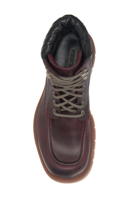 Shop Bottega Veneta Haddock Lug Sole Lace-up Boot In Jam/rubber