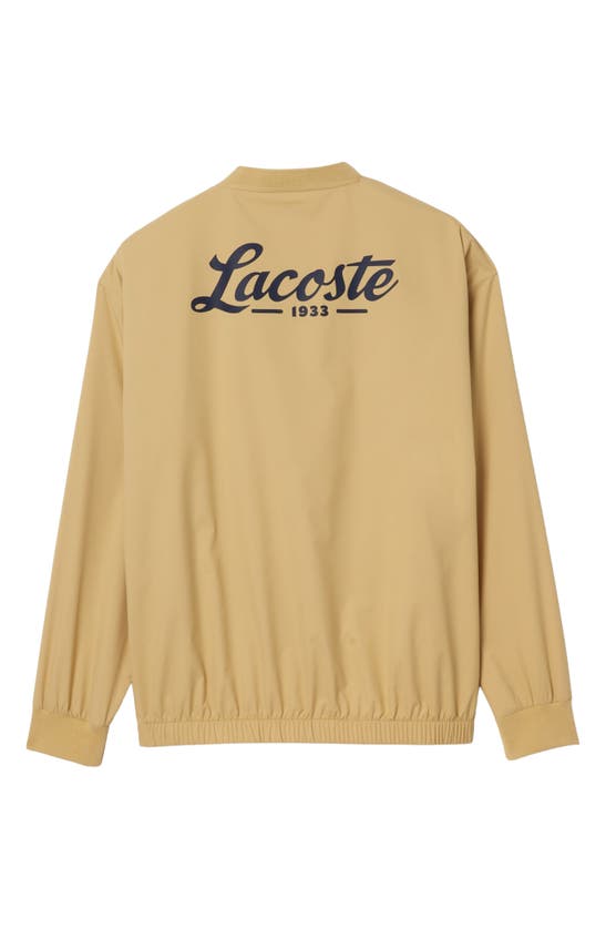 Shop Lacoste Water Repellent Golf Sweatshirt In Ixq Croissant