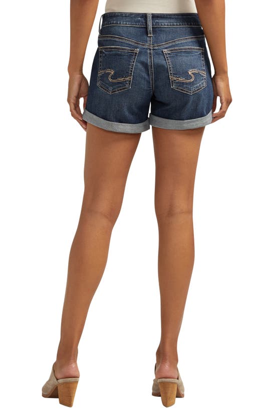 Shop Silver Jeans Co. Mid Rise Denim Boyfriend Shorts In Indigo