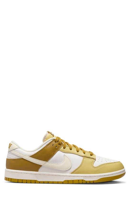 Shop Nike Dunk Low Retro Basketball Sneaker In Bronzine/ Coconut Milk/ Gold