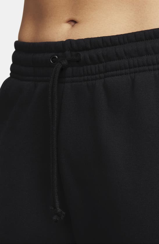 Shop Nike Sportswear Phoenix Fleece Mid Rise Joggers In Black/ Sail