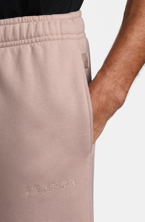 Jordan Wordmark Cotton Fleece Sweatpants In Pink Oxford