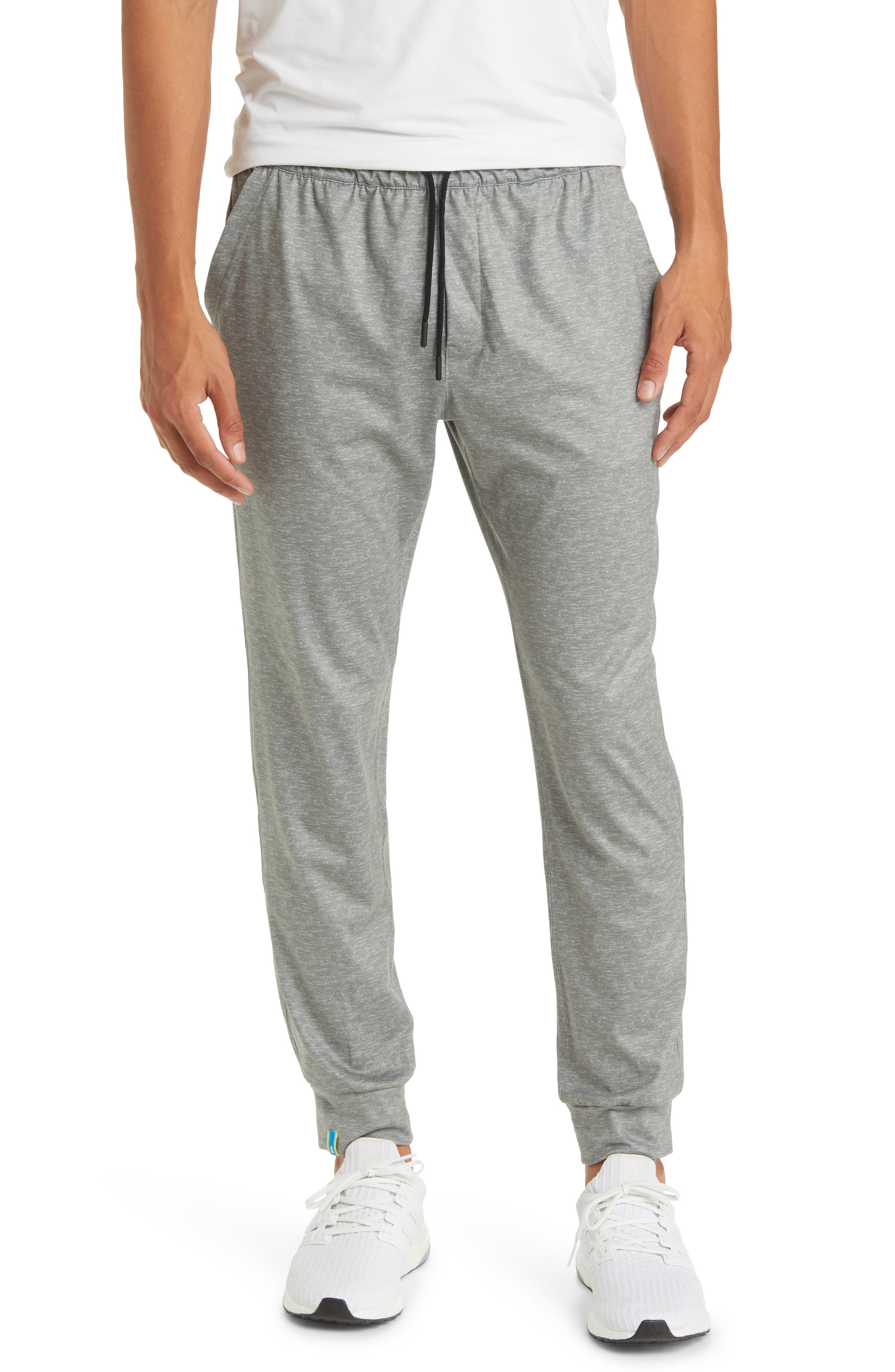 grey sweatpants with white drawstring