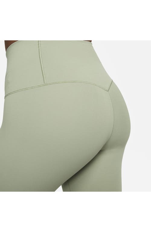 Shop Nike Zenvy Gentle Support High Waist Crop Leggings In Oil Green/black