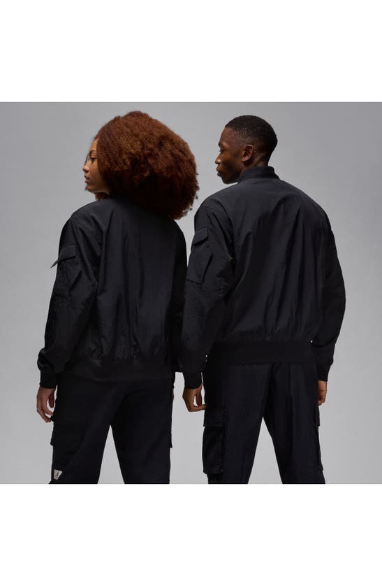 Shop Jordan Essentials Lightweight Nylon Renegade Jacket In Black