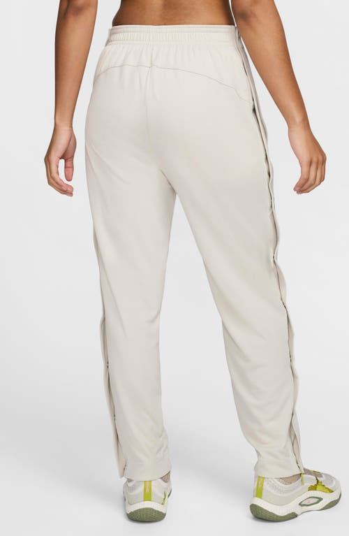 Shop Nike Dri-fit Tear Away Basketball Pants In Light Bone/light Bone/black