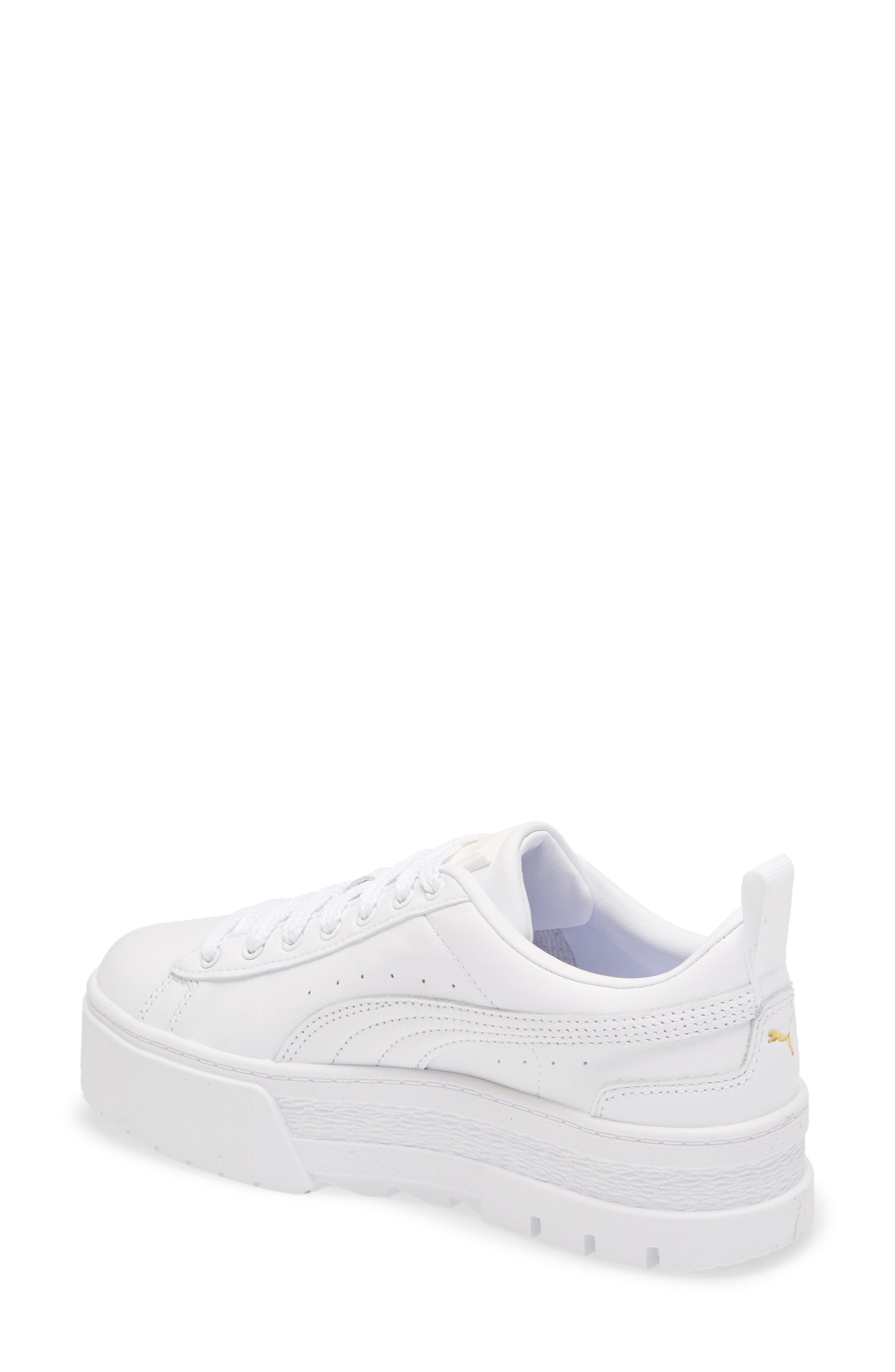 white platform pumas