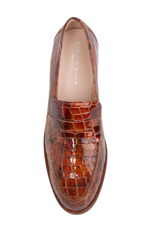 Shop Patricia Green Vince Croc Embossed Penny Loafer In Cognac Patent Croc