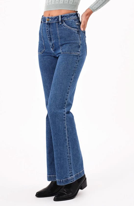 Shop Rolla's East Coast Flare Jeans In Mid Vintage Blue