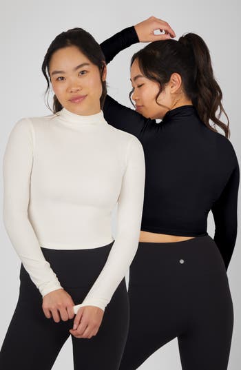 Shop Yogalicious Zenly Evelyn Set Of 2 Funnel Neck Long Sleeve Crop Tops In Gardenia/black