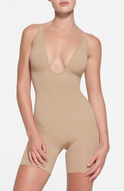 Shop Skims Seamless Sculpt Plunge Mid Thigh Bodysuit In Clay