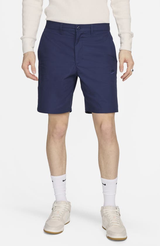 Shop Nike Club Flat Front Chino Shorts In Midnight Navy/ Midnight Navy