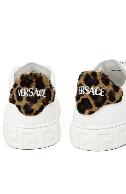 Shop Versace Greca Genuine Calf Hair Embellished Low Top Sneaker In White Brown Spotted Calf Hair