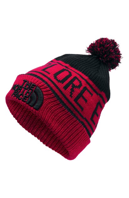 Click to view more detailed imagery on our partner's website The North Face Retro Pom Beanie In Red/ Black
