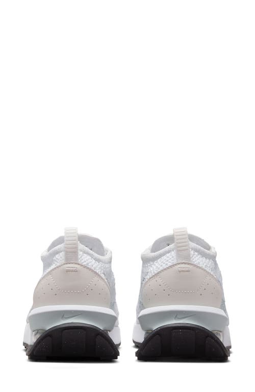 Shop Nike Air Max Flyknit Racer Sneaker In White/platinum/black