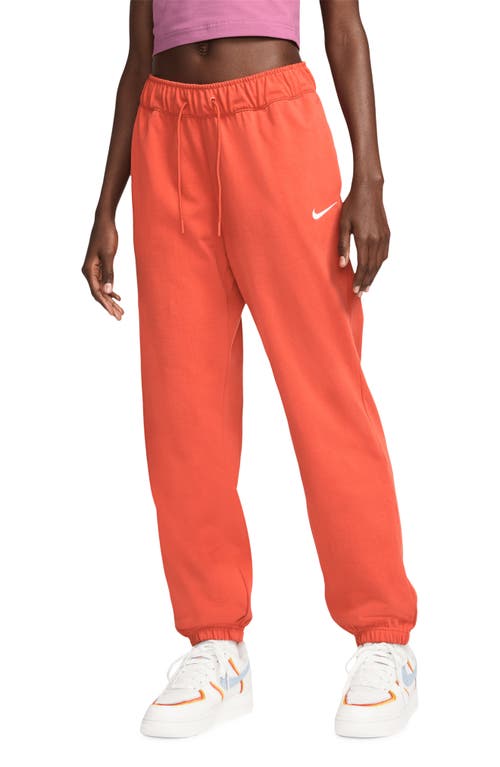 Nike Sportswear Easy Joggers in Mantra Orange/White