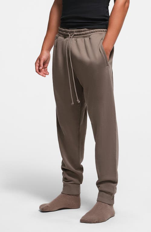 Shop Skims Tapered Fit Cotton Blend Joggers In Truffle