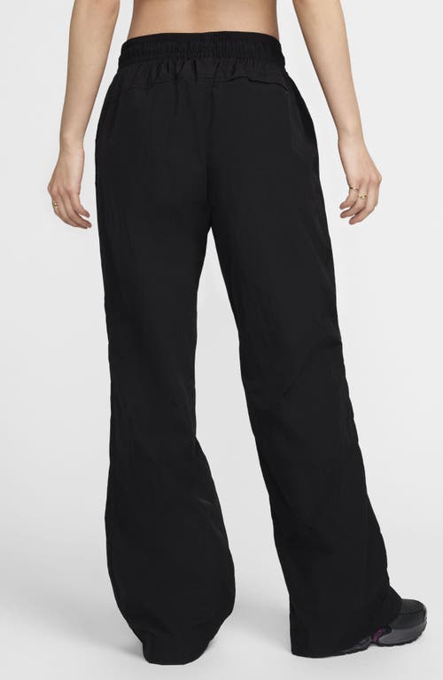 Shop Nike Sportswear Repel Zip Hem Pants In Black/white