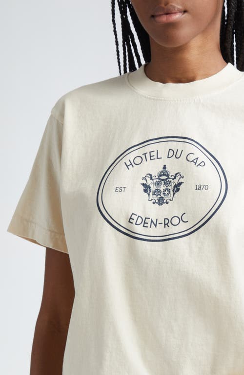 Shop Sporty And Rich Sporty & Rich Eden Roc Crest Cotton Graphic T-shirt In Cream