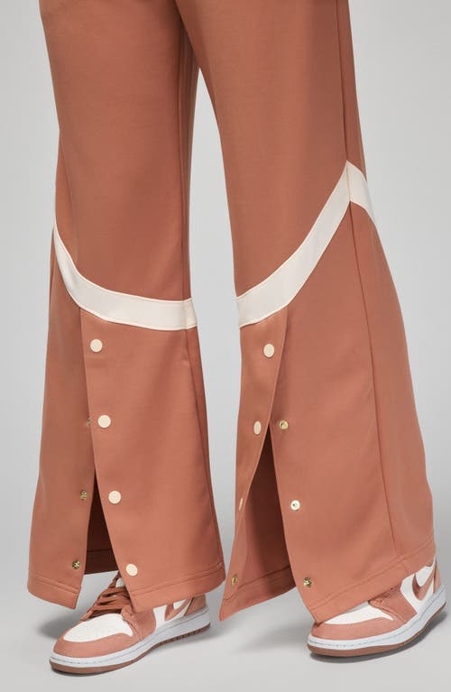 Shop Jordan (her)itage Snap Track Pants In Sky Orange/guava Ice