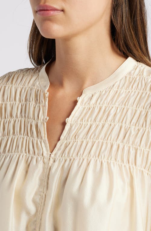 Shop Frame Smocked Silk Blend Top In Champagne