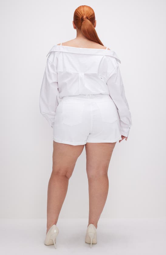Shop Good American Good Girlfriend Raw Hem Mid Rise Denim Shorts In White001