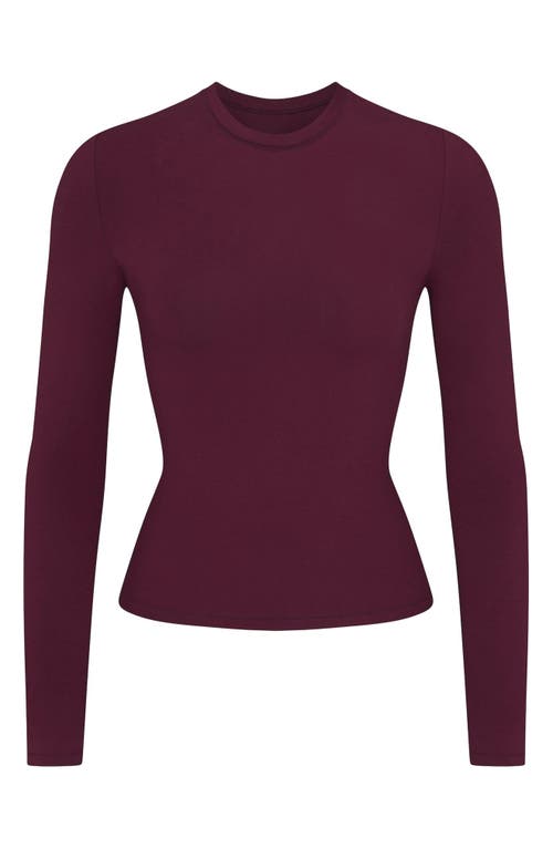 Shop Skims Stretch Cotton Jersey Long Sleeve T-shirt In Deep Berry