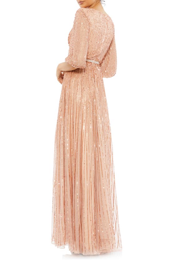 Shop Mac Duggal Sequin Faux Wrap Gown In Apricot