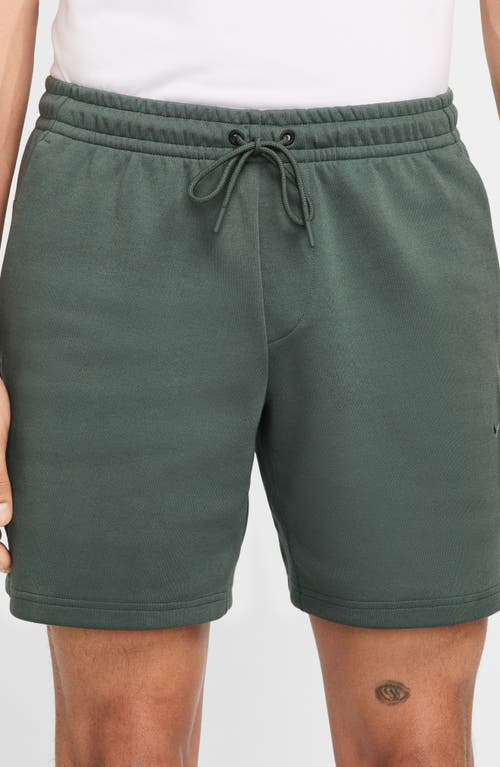 Shop Nike Primary Dri-fit Unlined Shorts In Vintage Green/vintage Green