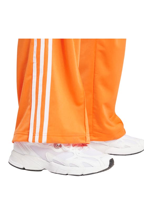 Shop Adidas Originals Adidas Firebird Track Pants In Orange