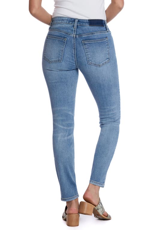 Shop Hint Of Blu Mid Rise Skinny Jeans In Tumbled Blue