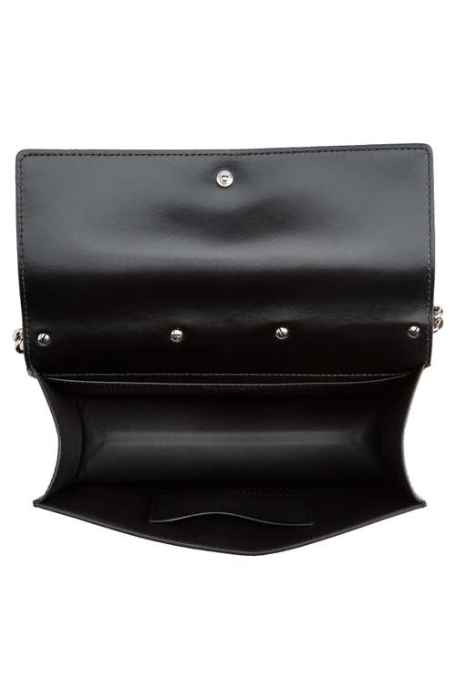 Shop Alexander Mcqueen Slash Cutout Knuckle Denim Crossbody Bag In 4290 Denim/black