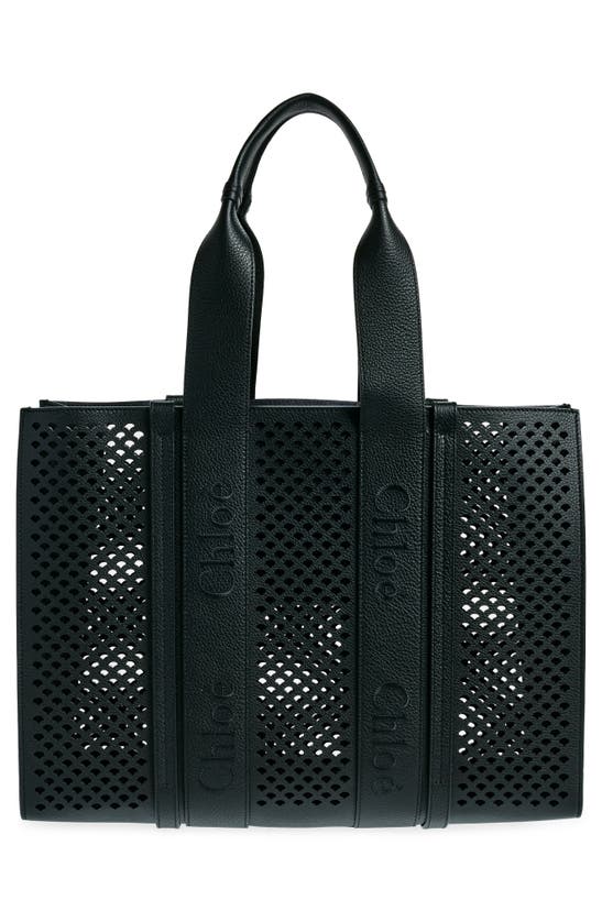 Shop Chloé Large Woody Perforated Leather Tote In Black
