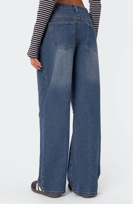 Shop Edikted Debbie Ripped Low Rise Wide Leg Jeans In Indigo-blue-raw-wash