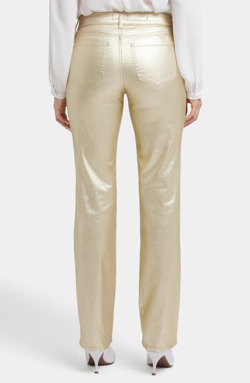 Shop Nydj Marilyn Coated Straight Leg Jeans In Gold Coated