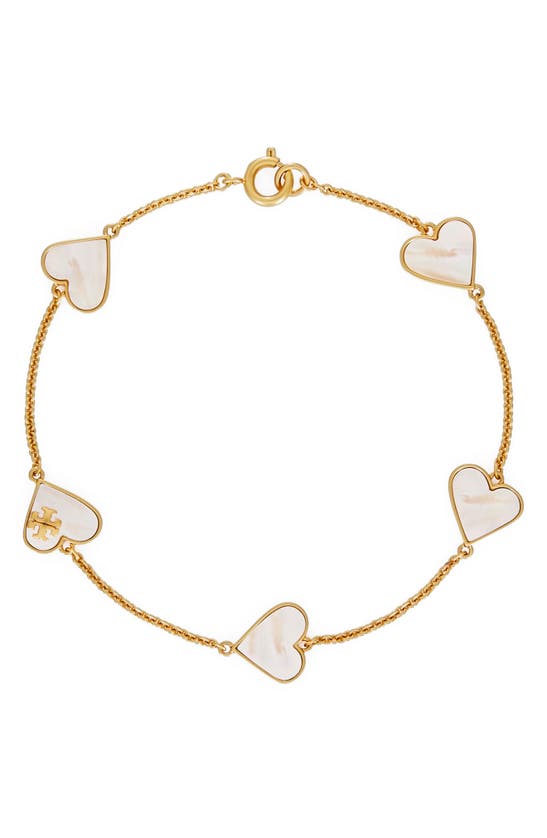 Shop Tory Burch Heart Station Bracelet In Rolled Brass / Mother Of Pearl