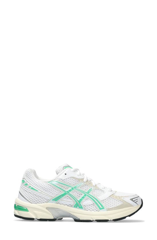Shop Asics Gel-1130™ Running Shoe In White/ Malachite Green