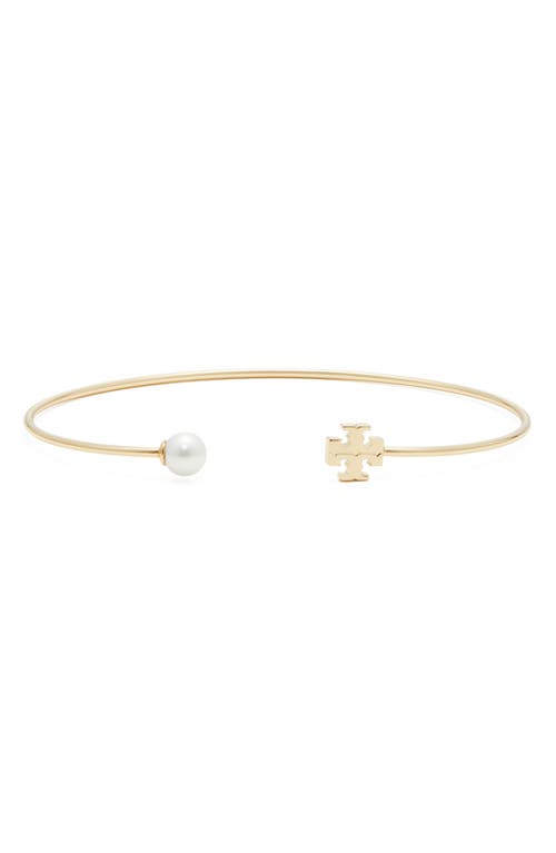 Shop Tory Burch Kira Imitation Pearl Cuff Bracelet In Tory Gold/ivory Pearl