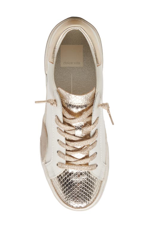 Shop Dolce Vita Zina Sneaker In White/gold Leather