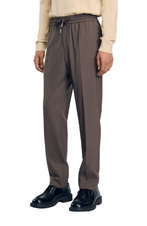 Shop Sandro Elasticated Waist Trousers In Taupe