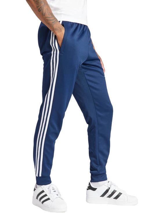 Shop Adidas Originals Adidas Adicolor Superstar Track Pants In Night Indigo