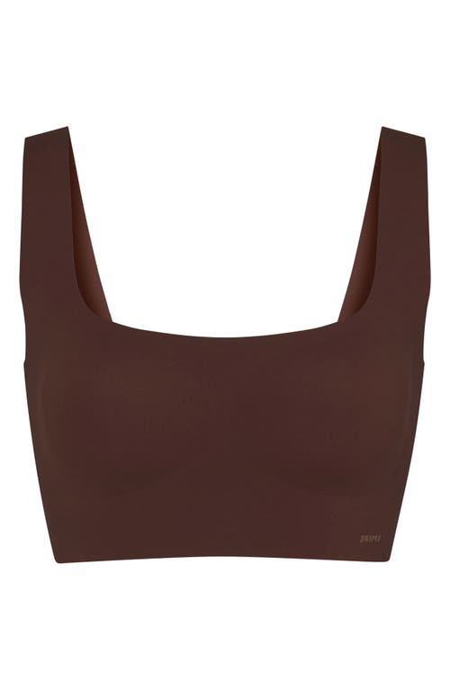 Shop Skims Naked Wireless Scoop Longline Bra In Cocoa