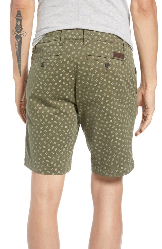 Shop Ag Flora Print Slim Fit Shorts In Flora Canyon Moss