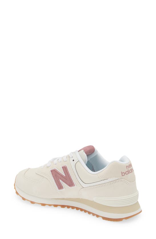 Shop New Balance 574 Sneaker In Linen/ Rosewood