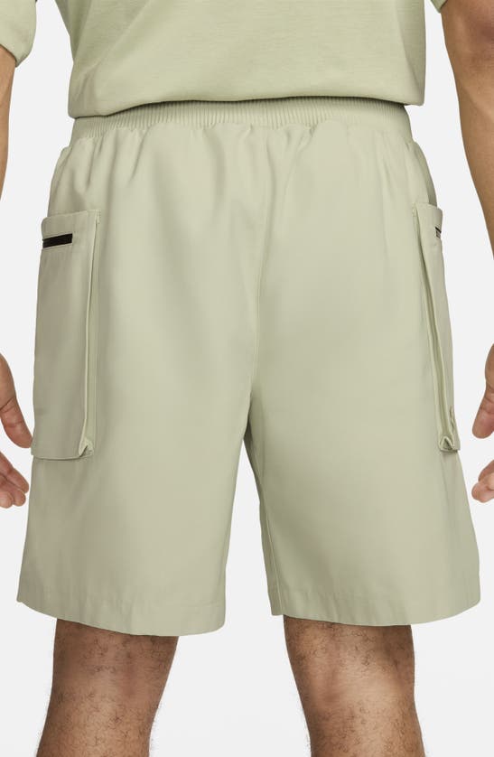Shop Nike Sportswear Tech Pack Utility Shorts In Olive Aura/ Black/ Olive Aura