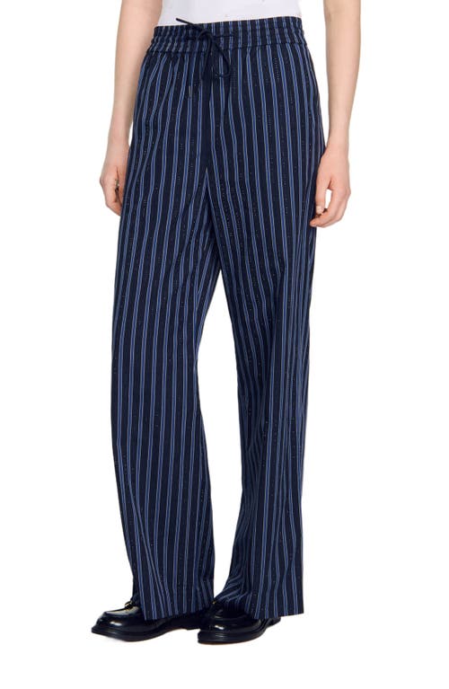 Shop Sandro Striped Trousers In Blue